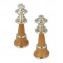 Metal Brass and wood chess pieces made by hand and assembled by hand with gold and silver plated