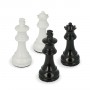 Chess pieces in white and black lacquered wood